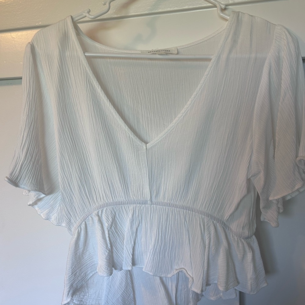Lightweight White V-Neck Ruffle Peplum Top